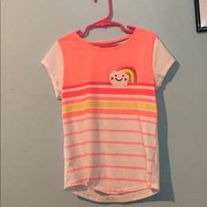 A pink and yellow kids shirt